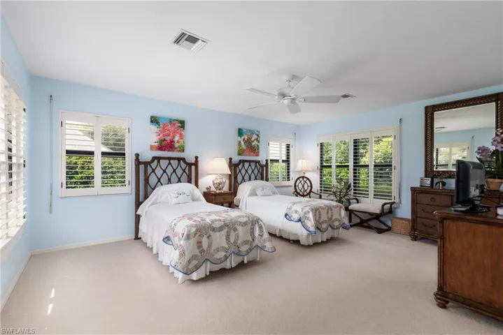 Ensuite guest area, with huge walk-in closet; privacy, space and comfort await.