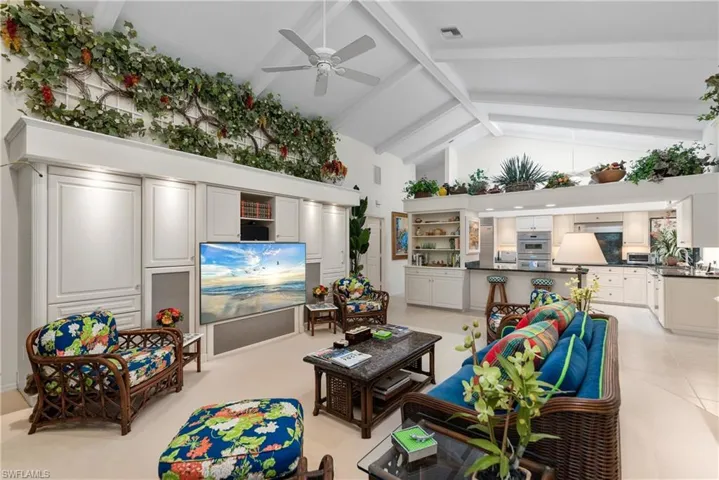 With beams, transom windows, fireplace, built ins -  everyone will gather here.