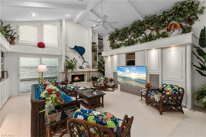 Lovely beamed ceilings, and inviting fireplace - pull up  a chair!