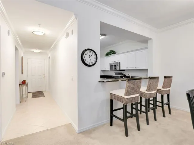 Entryway and Breakfast Bar/Kitchen