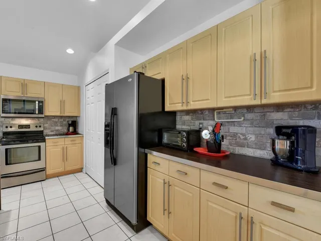 Lots Of Cabinet Space & Custom Backsplash