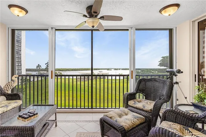 LARGE COMMONS IN FRONT OF A WIDE VIEW OF THE FMB BAY.