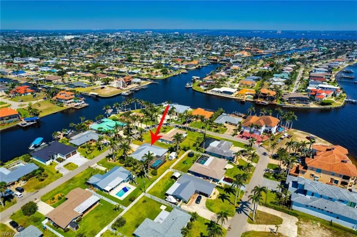 Bird's eye view with a residential view and a water view