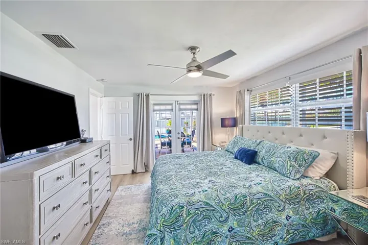 Master Bedroom and access to outside pool and sitting area