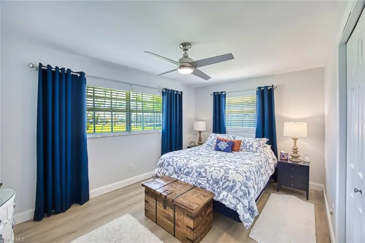 Bedroom featuring a closet, and light wood-type flooring