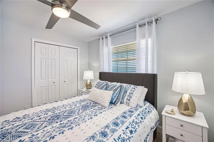 Guest Bedroom featuring a closet and ceiling fan