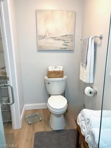 Master Bathroom featuring wood finished floors