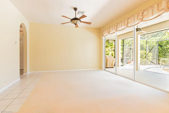 Family room with glass sliders to patio/lanai.