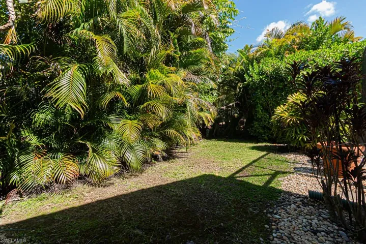 View of grassy side yard