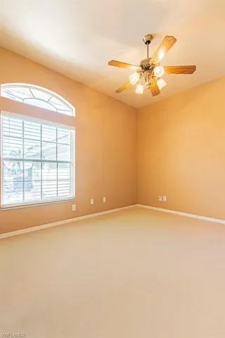 Large windows flood the room with natural light