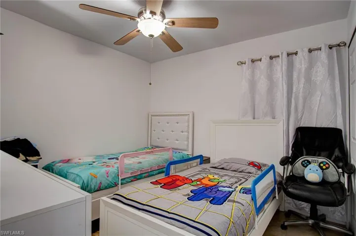 Bedroom featuring ceiling fan