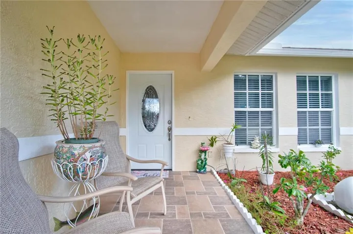 Entrance to property with a patio