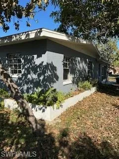 View of property exterior with stucco siding