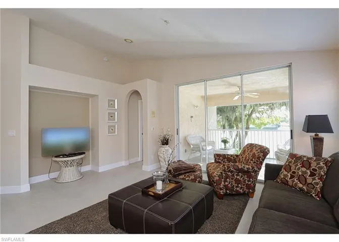 Living room with lofted ceiling