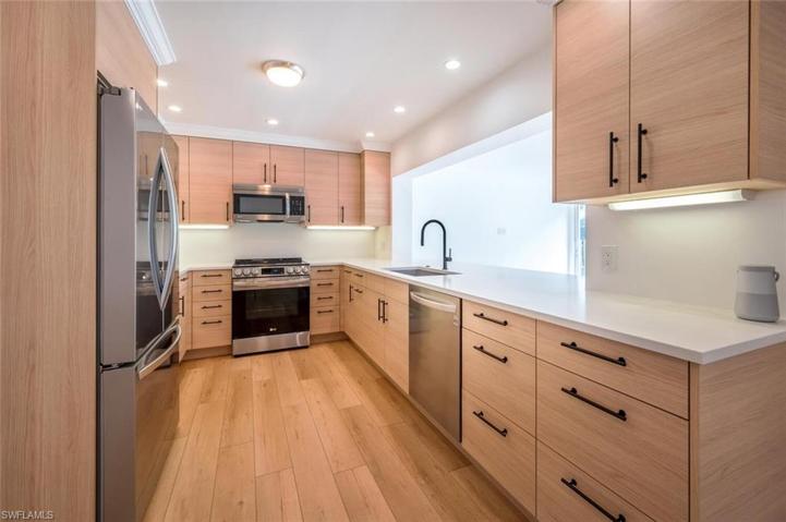 Luxury German Poggenpohl Cabinetry & LG Stainless Appliances