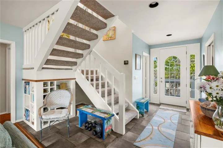 Entrance foyer with vaulted ceiling