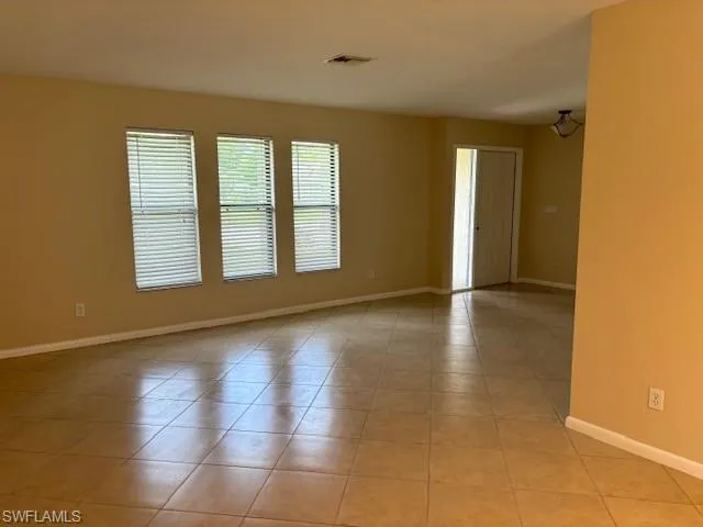 View of tiled empty room