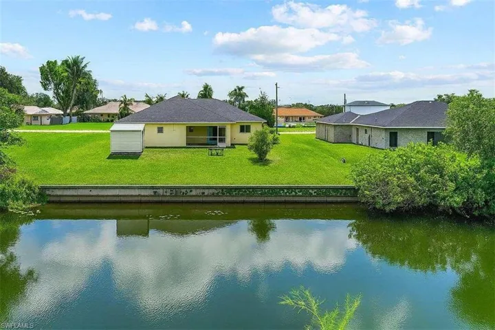 Water view featuring nearby suburban area