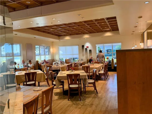 Indoor , outdoor restaurant with poolside service