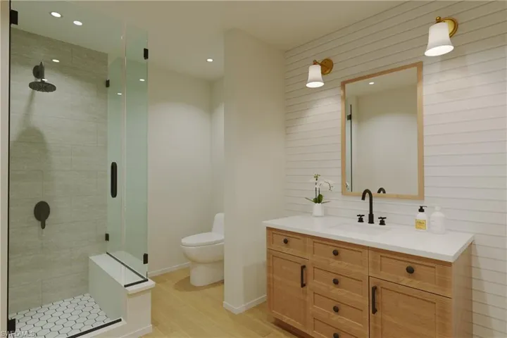 Photo includes reality renovation to showcase the possibility of the primary bathroom. Design services included with purchase!