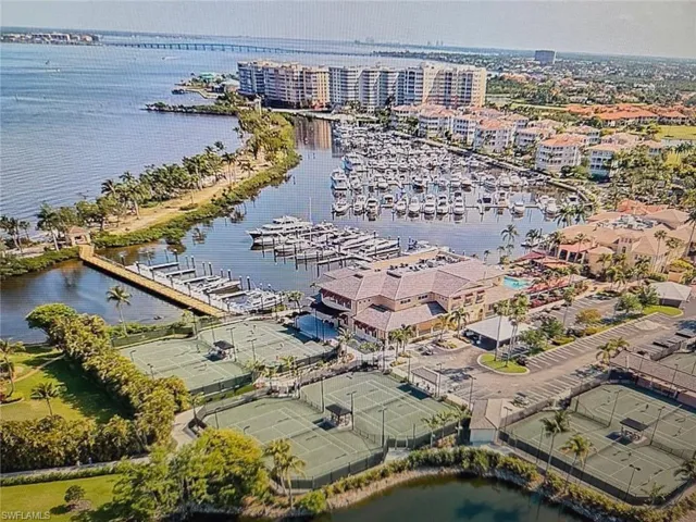 Aerial view of a large body of water and a marina