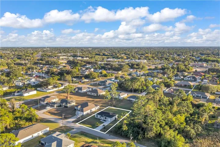 Aerial perspective of suburban area with property parcel outlined