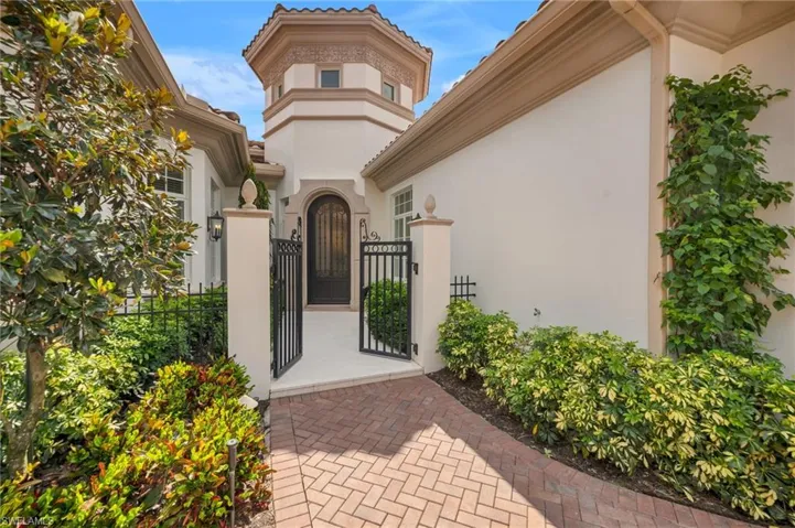 The courtyard entry is private and charming, with a complete landscaping and newer driveway renovation.