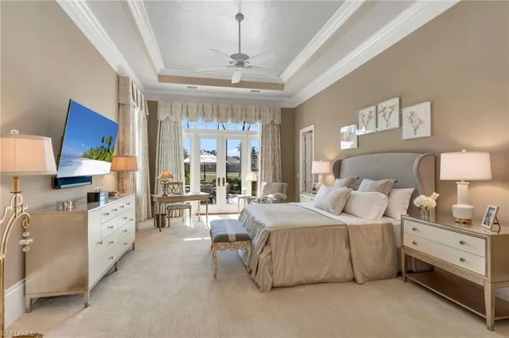 The Primary Suite is expansive with amazing private views and 13' ceilings and designer touches throughout...