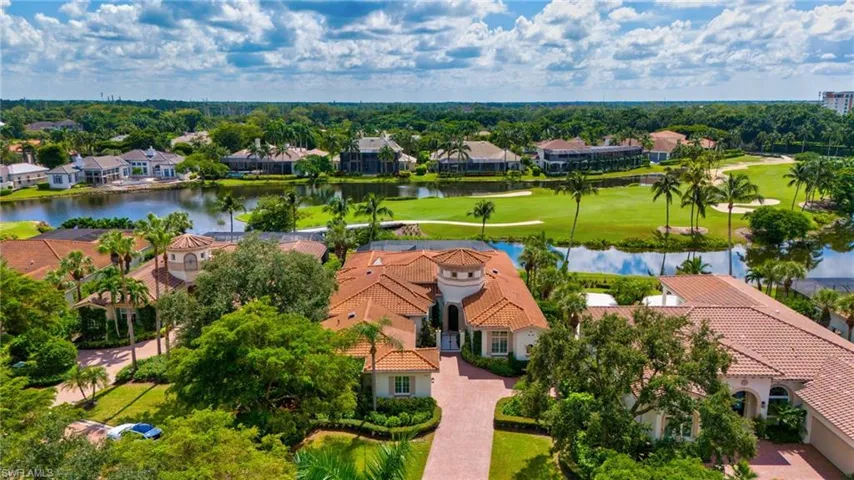 Located on the 13th of the Palm Course in Grey Oaks, this residence is truly and Estate Home.