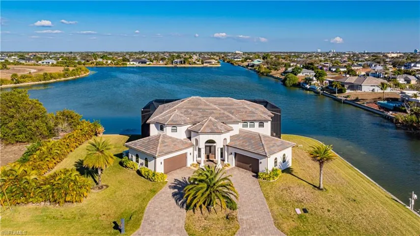 Aerial view of residential area with a large body of water