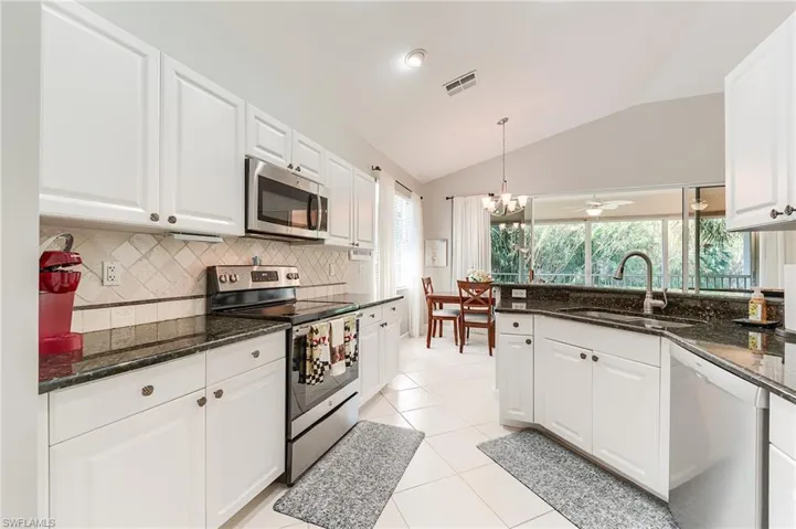 WHITE RAISED PANEL CABINETRY