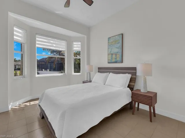 Bedroom featuring baseboards and a ceiling fan
