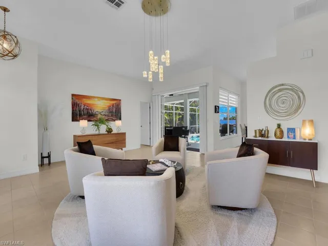 Living room featuring light tile patterned floors