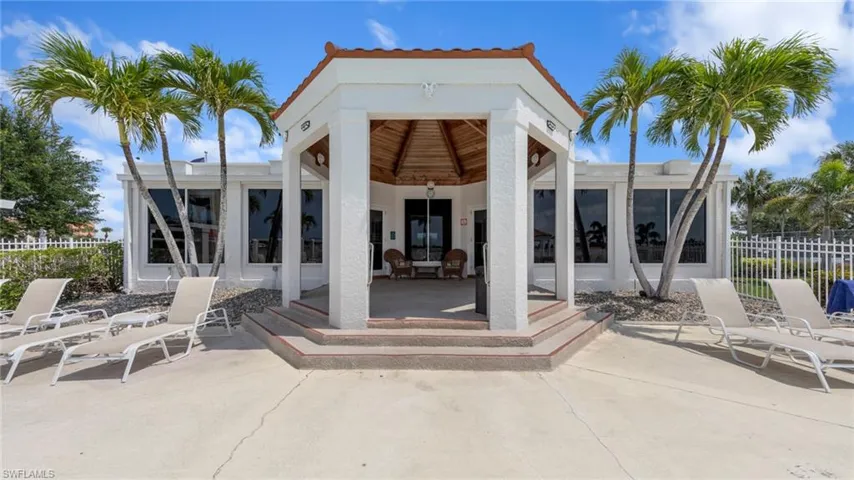 View of patio with fence