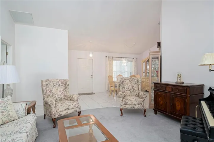Living room with light carpet