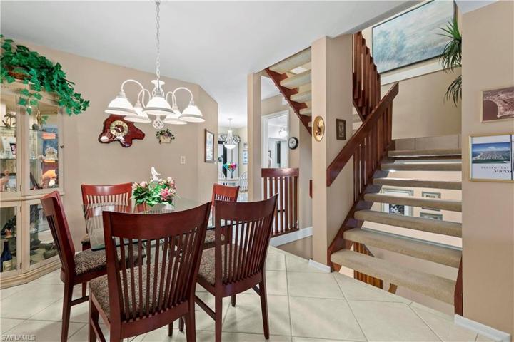 Tile throughout aside from carpeted stairs and bedrooms