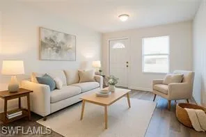 Living area with wood finished floors