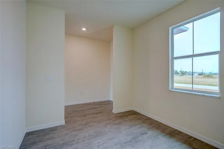 Empty room featuring light wood-style tileflooring