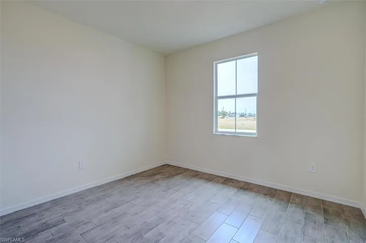 Unfurnished room featuring light hardwood / wood-style floors
