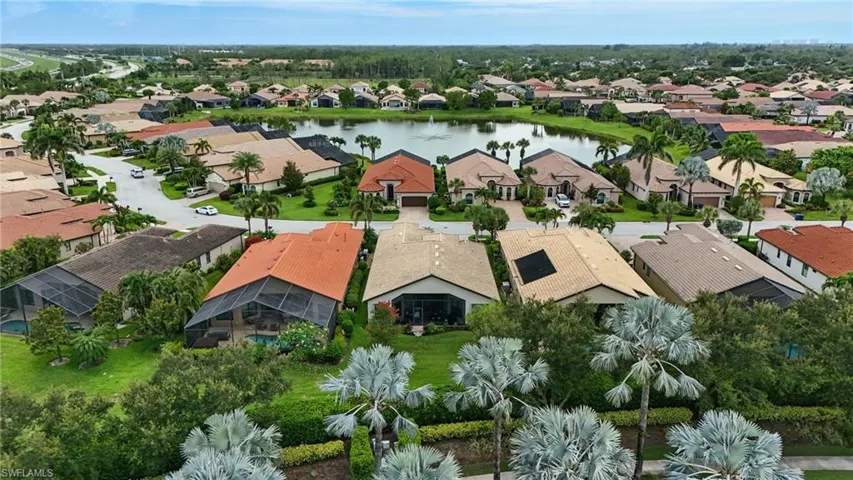 Aerial view of residential area with a nearby body of water