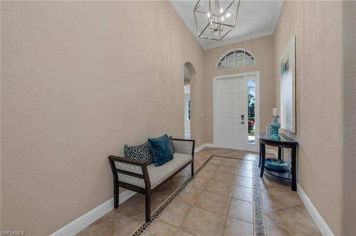 NEW light fixture and volume entryway ceillings.