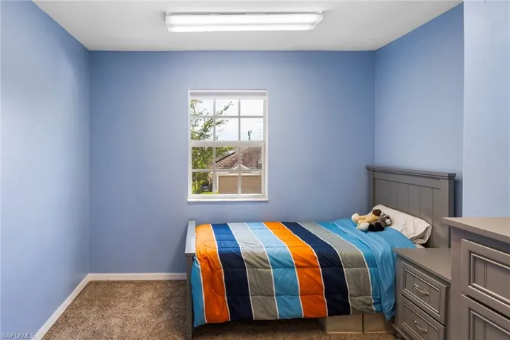 Unfurnished bedroom featuring carpet flooring