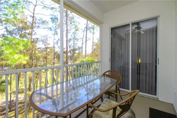 Sunroom featuring ceiling fan
