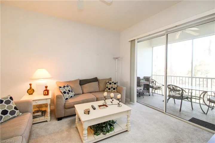 Living room with light carpet