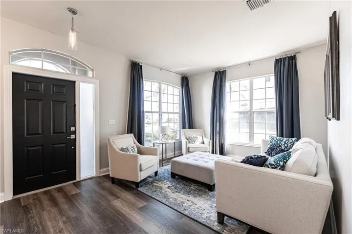 Foyer featuring dark wood-type flooring