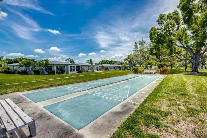 Surrounding community featuring a lawn