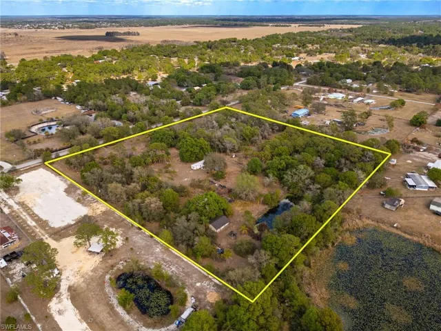 Aerial view of property's location featuring property parcel outlined