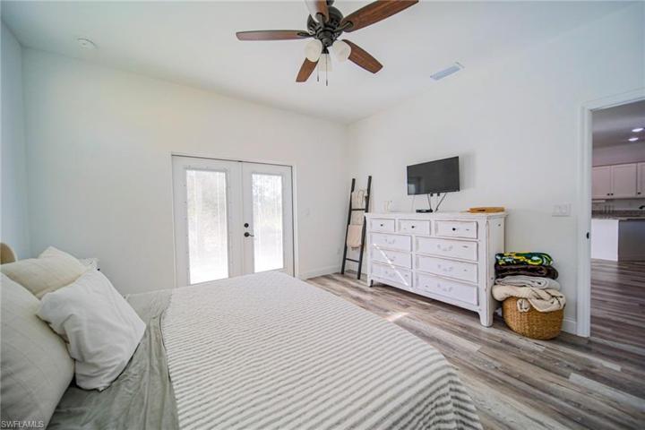 The Oversized Master Bedroom Has Dual Glass French Doors Leading Out To The Back Yard!