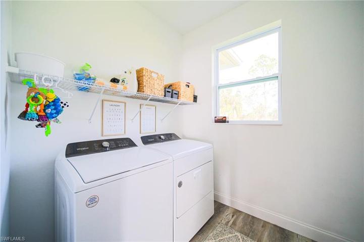 Oversized Laundry Room With Metal Shelving!