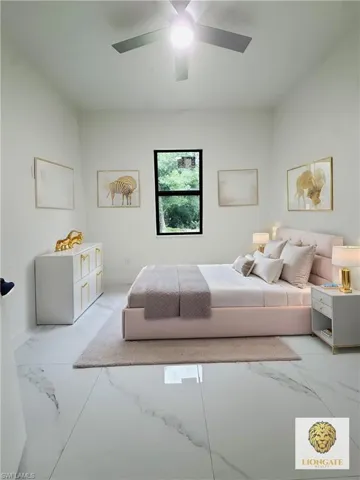 Bedroom with a ceiling fan and baseboards